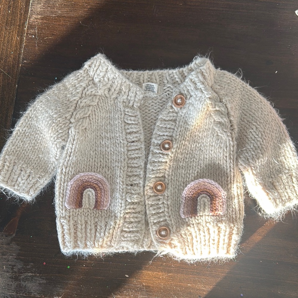 Hand-Knit Baby Cardigan with Rainbow Pockets